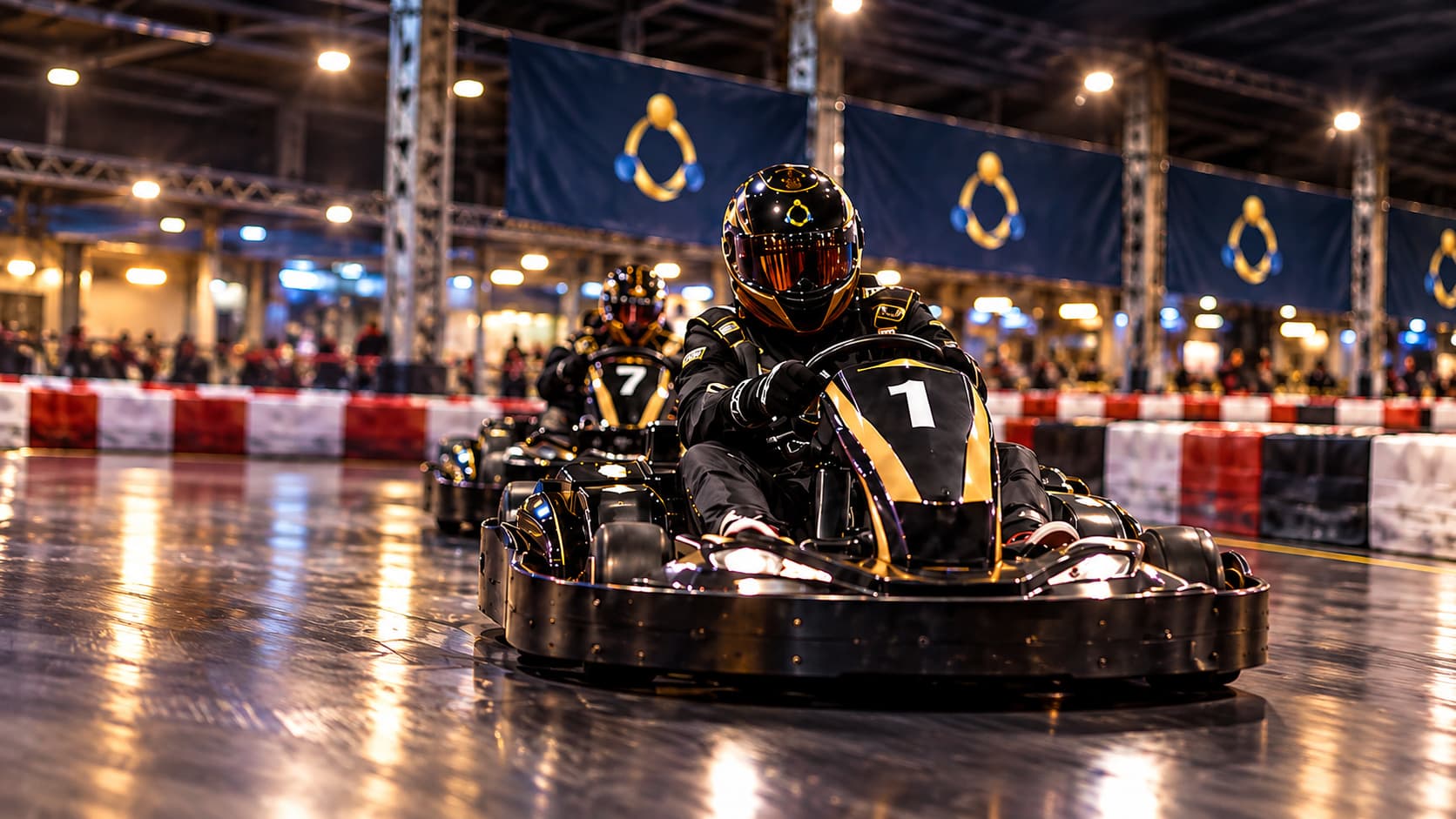 Black and gold go-karts race on a polished indoor track under bright arena lights.